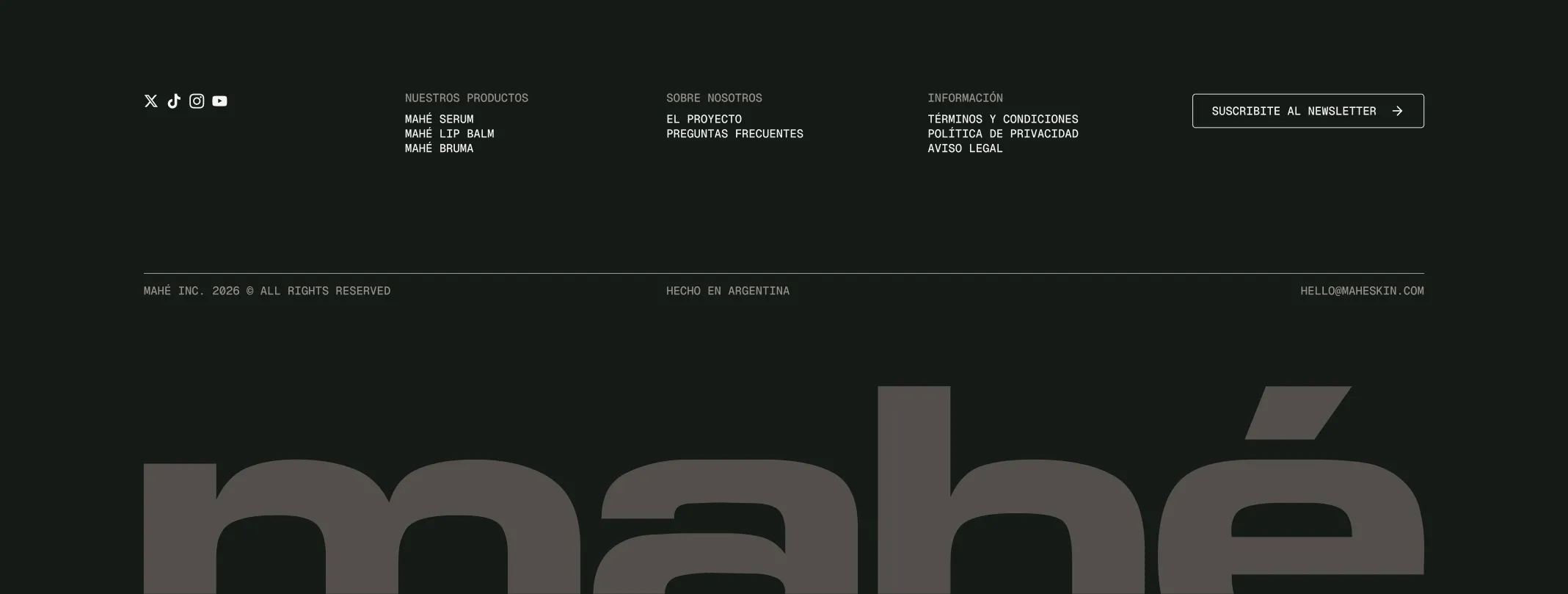 Mahé site footer with navigation links and an oversized mahé wordmark
